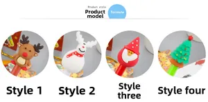 Detail view of four Christmas silicone pen toppers featuring reindeer, Santa and tree