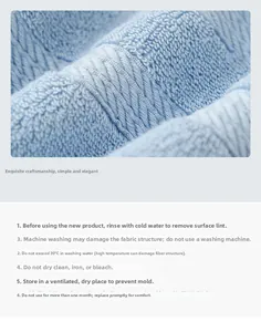 Macro shot of light blue cotton towel texture with delicate wave weaving and soft pile