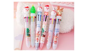 Close-up of multicolor Christmas ballpoint pens with 10 colors and 3D cartoon toppers