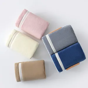 Five-color coral fleece towels set in white metal basket, soft and thick absorbent texture