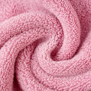 Soft pink thickened cotton towel with high-absorbency terry loops for home and bath use