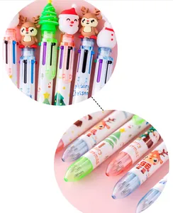 Detail of Christmas multi-color ballpoint pen with 3D cartoon silicone toppers and tips