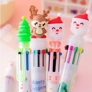 Detailed macro view of 10-color Christmas ballpoint pens with cute 3D cartoon toppers