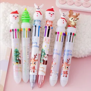 Christmas multi-color shuttle pens featuring festive cartoon toppers on soft white plush