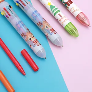 Detail van kerst multi-color balpennen met cartoon rendier en kerstman patronen