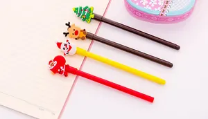Detailansicht von Weihnachts-Gelschreibern mit Weihnachtsmann- und Rentier-Silikonfiguren