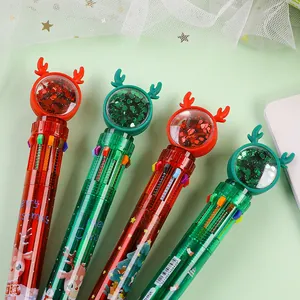 Details von Weihnachts-Kugelschreibern mit Rentier-Motiv und glänzenden Pailletten