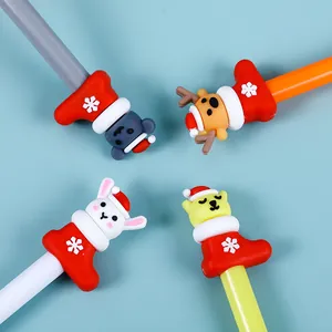 Christmas neutral pen set with reindeer and pine tree designs in festive socks