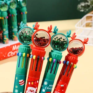 Detailed view of Christmas multi-color pens with reindeer topper and festive holiday patterns