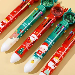 Close-up of 10-color Christmas ballpoint pens with cartoon holiday prints and sequins