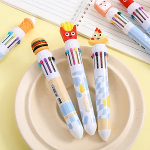 Macro detail of 10-color shuttle pens featuring cartoon food toppers on ceramic plate