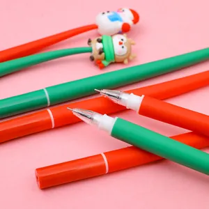 Close-up of 0.5mm needle tip and festive silicone character toppers on Christmas pens