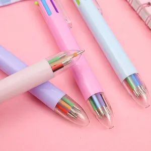 Close-up of 6-color unicorn ballpoint pen with transparent tip and multicolor refills
