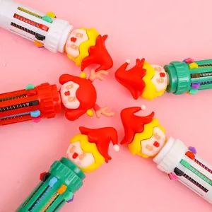Close-up of 10-color Christmas ballpoint pens with cartoon deer and Santa hat toppers