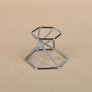 Silver geometric metal stand with hexagonal frames for crystal ball home display