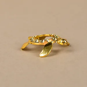 Golden sea turtle crystal ball stand with sparkling rhinestone inlay on a sleek base