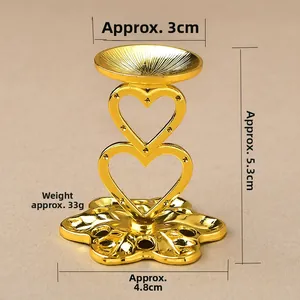 Macro view of gold heart-shaped metal stand with precise height and base dimensions
