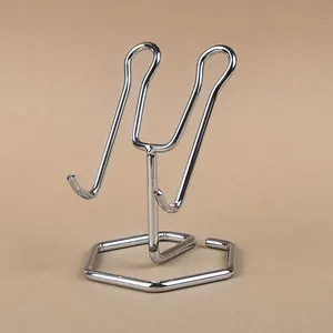 Polished silver metal phone stand with stable hexagonal base for jewelry display