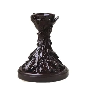 Vintage brown resin leaf carved candle holder stand with a stable round pedestal base