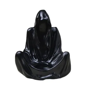 Mystic hooded figure resin ornament with glossy black finish for home decor