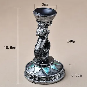 Gothic silver serpent candle holder with dimension markings 10.6cm height and 6.5cm base