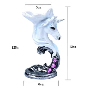 Statuetta testa di unicorno con corno d'argento e gemme viola dimensioni 12x6cm