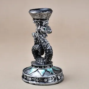 Silver dragon resin candle holder with green eyes and cosmic star engraved base stand