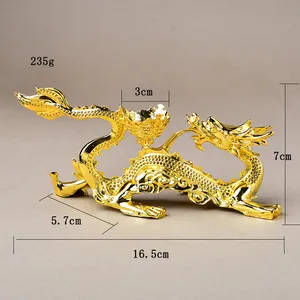 Dimensions détaillées de l'ornement dragon doré avec 16,5 cm de long et 7 cm de haut