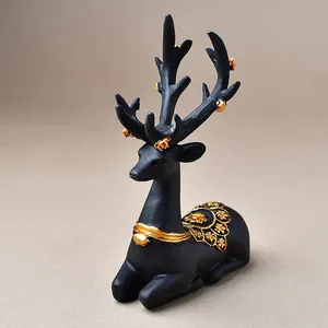 Elegant black and gold sitting deer ornament for home decor and crystal ball stand