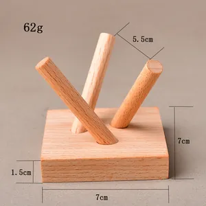 Solid wood tripod stand for crystal ball display with natural grain and polished finish