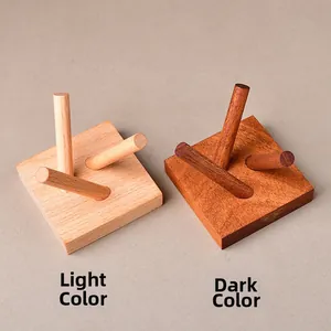 Comparison of light and dark solid wood crystal ball display stands with three prongs