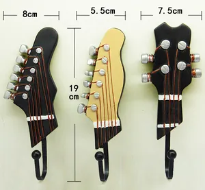 Detail view of 3-pack guitar headstock wall hooks with dimensions and metal hangers