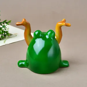 Ceramic green frog display stand and pen holder for creative desktop home decoration