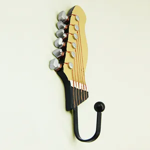 Detailed side view of guitar headstock wall hook with black U-shaped metal hanger