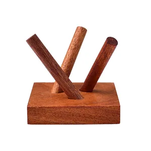 Polished solid wood ring display stand with three pillars on a square base