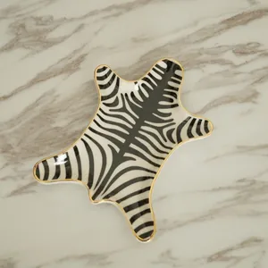 European style ceramic zebra print jewelry tray with elegant gold trim and hide shape