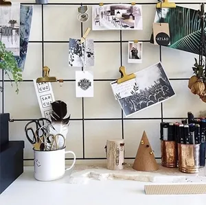 Nordic black metal mesh wall grid with golden stainless steel clips for photo display