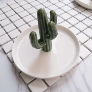 Golden cactus ceramic jewelry tray with white round base for rings and earrings