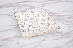 Square ceramic jewelry tray with swallow print and gold rim with Brave Wings quote