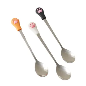 Set of three cute cat paw stainless steel stirring spoons in orange, white, and black colors