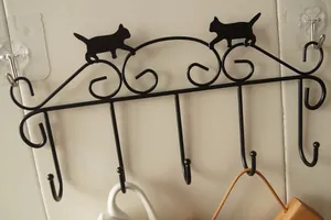 Vintage black metal cat wall hook rack with five hooks for coats and mugs