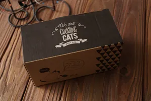 Minimalist gift box for ceramic cuddling cats pair mugs on dark wood background