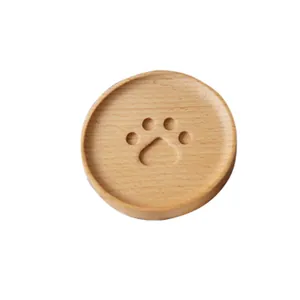 Natural wood coaster with cute carved cat paw pattern and protective raised edges
