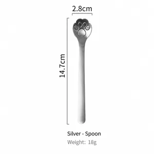 Detailed view of silver cat paw stainless steel dessert spoon with 14.7cm dimensions