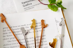 Detailed view of cat-themed long handle coffee spoons in gold, silver, and rose gold finish