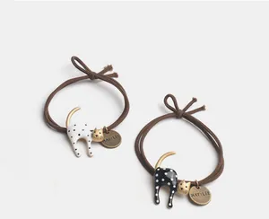 Set di due elastici per capelli a forma di gatto a pois con ciondoli incisi