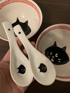 Japanese ceramic ramen bowl and spoon set featuring cute minimalist black cat design