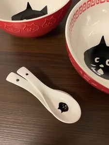 Japanese style black cat ceramic tableware set including red bowls and white spoons