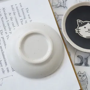 Japanese style hand-painted ceramic cat saucer with matte black glaze and cute kitty face