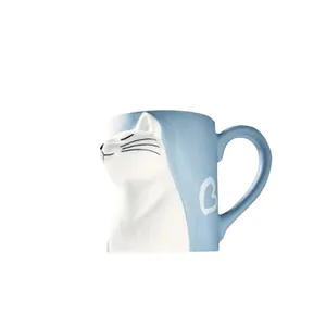 Japanese ceramic cat mug in sky blue with 3D white kissing cat relief and heart design